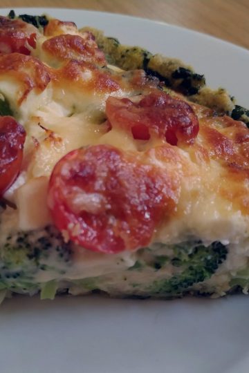 broccoli-pie-quarter-on-white-plate-on-table