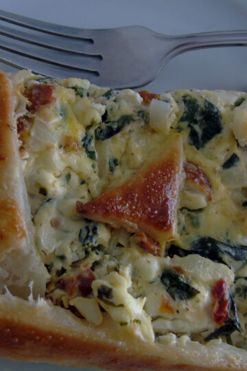 Spinach and feta pie piece