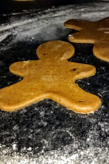 raw gingerbread dough - gingerbread men shaped