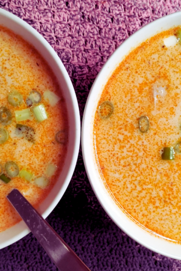 Two bowls of Tom Kha Gai soup