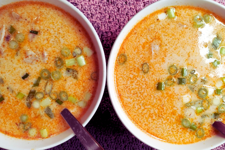 Two bowls of Tom Kha Gai soup