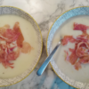 Two bowls of melon soup on counter